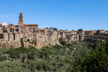 Pitigliano - the picturesque medieval town founded in Etruscan time on the tuff hill in Tuscany,...