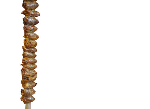 Chicken heart on a skewer. Traditional Brazilian barbecue