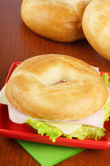 Bagel with ham, cheese and lettuce