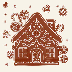 Gingerbread house for Christmas. Cute handmade honey gingerbread with patterns and sweets.