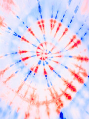 Spiral tie dye pattern. Colorful red and blue tiedye wallpaper backdrop. Americana colors. - 543241571