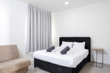 Luxury white minimalistic bedroom interior decor.