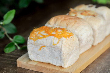 loaf of  bread, egg bread or sweetmeat bread or wholewheat bread