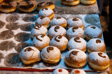 Decorative donuts in a Jerusalem bakery during the celebration of the Jewish holiday of Hanukkah, when it is traditional to eat foods fried in oil.