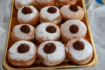 Decorative donuts in a Jerusalem bakery during the celebration of the Jewish holiday of Hanukkah, when it is traditional to eat foods fried in oil.