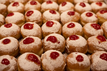 Decorative donuts in a Jerusalem bakery during the celebration of the Jewish holiday of Hanukkah, when it is traditional to eat foods fried in oil.