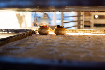 Donuts on an empty baking shelf in a Jerusalem bakery during the celebration of the Jewish holiday...