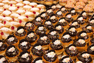 Decorative donuts in a Jerusalem bakery during the celebration of the Jewish holiday of Hanukkah, when it is traditional to eat foods fried in oil.