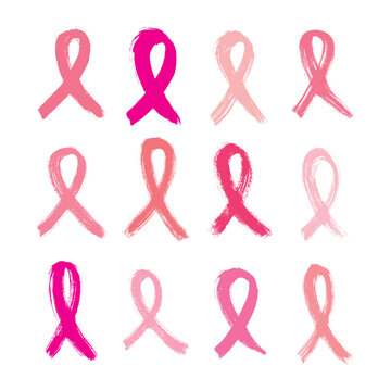 Set of pink ribbons cancer control symbol. Brush strokes.
