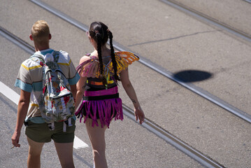 Couple with costumes at 29th Street Parade at City of Zürich on a sunny day. Photo taken August 13th, 2022, Zurich, Switzerland.