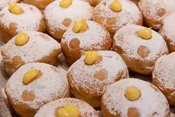 Decorative donuts  in a Jerusalem bakery during the celebration of the Jewish holiday of Hanukkah, when it is traditional to eat foods fried in oil.