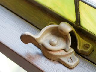 Vintage window lock hardware for double-hung window wood sashes, restored