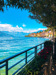 Spectacular panoramic view of Bellagio on Lake Como, Lombardy, Italy. Scenic landscape of the lake and Swiss Alps in the background on a sunny summer day. 