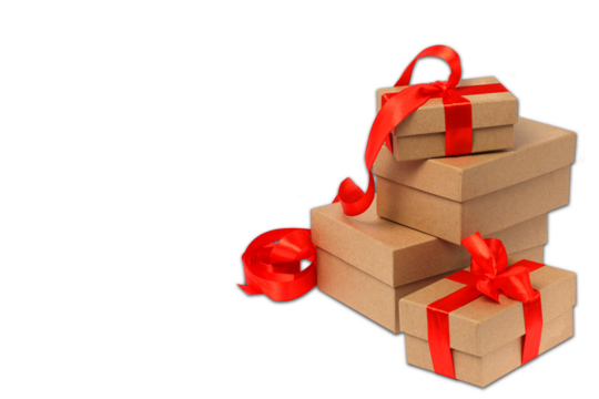 cardboard  gift boxes with a red ribbon bow. Packaging for Christmas gifts