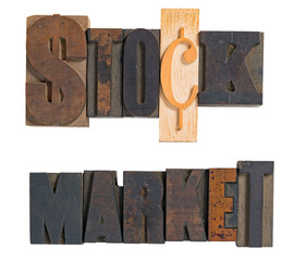 Stock Market word isolated spelled out in vintage wooden letterpress printing blocks