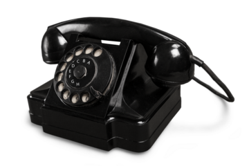 Retro black telephone on white background