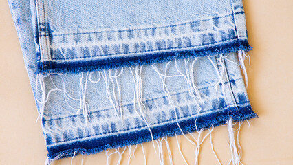 jeans on the background, blue and black jeans lie on a white background,