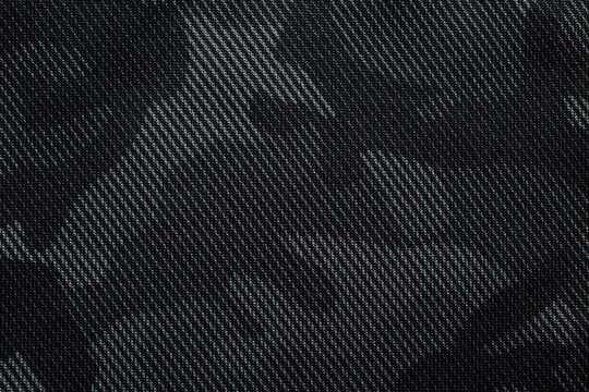 Camouflage pattern. Trendy dark gray camouflage fabric. Military texture. Dark back.