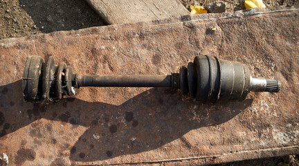 Photo of old used front drive axle