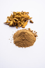 Ayurvedic Daruharidra - Daru haldi or tree turmeric isolated over white background