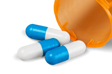 Three medical pills isolated on white background