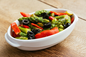 Roasted Pepper, Asparagus marinated in a Raspberries and Cilantro Vinaigrette