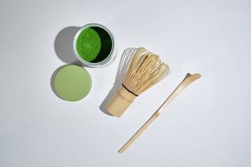 Green matcha close-up. Matcha Organic Green Tea Ceremony. Traditional tools for making matcha....