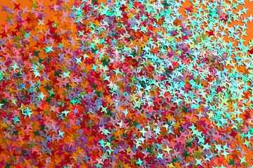 Obraz premium Shiny bright colorful glitter as background, top view