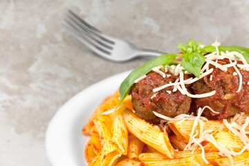 Pasta noodle dish in plate, tasty food concept.