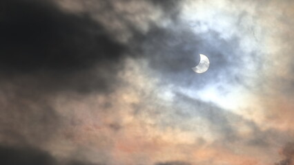 A dramatic solar eclipse. Dark leaden clouds in the sky. Eclipse of 2022 © jarizPJ