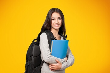 Young woman student with books study on gradien background.