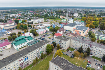 aerial panoramic view from height of a multi-storey residential complex and urban development in autumn day