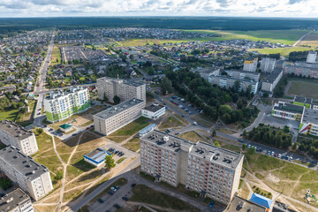 aerial panoramic view from height of a multi-storey residential complex and urban development in autumn day