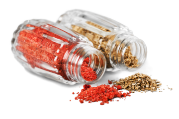 Rich colorful spicy  cuisine & healthy lifestyle concept: Natural spices & herbs. Set of red, yellow Mediterranean & turkish original spices & herbs. Closeup Isolated on white