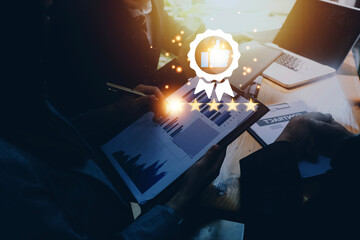 Hand shows the sign of the top service Quality assurance, Guarantee, Standards, ISO certification...