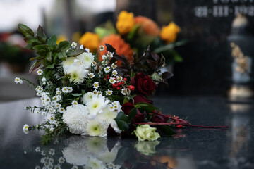 bouquet of flowers on the grave