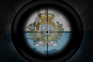 sniper scope aimed at flag of san marino on the khaki texture background. military concept. 3d illustration