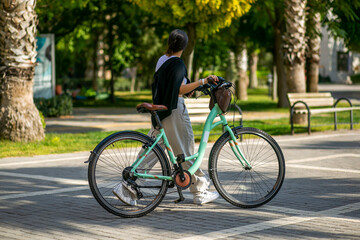 Fototapeta premium a woman on a bicycle