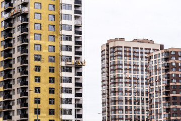 modern multi-storey residential building against the sky for the whole frame