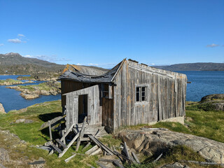 Ruined wooden house in the abandoned fishing village of Assaqutaq, Greenland