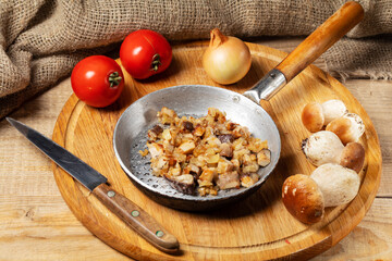 Fried porcini mushroom, Boletus mushroom, ceps  on the pan. Wild mushroom, Ukraine.