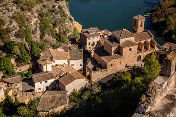 Aerial view of the medieval town of Miravet along the Ebro river in Catalonia, Tarragona province...