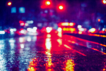 Night city lights, rain, bokeh, flares, reflections. 3d