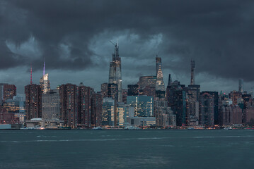 NYC Cityscape with Stormy Cloudy Blue Sky in Background