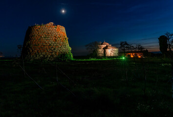 Night view of the Nuraghe and Church of Santa Sabina, located in the municipality of Silanos, Nuoro...