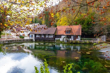 Fototapeta na wymiar The Karst Spring Blautopf in Blaubeuren in Autumn, Schwäbische Alb, Germany, Europe