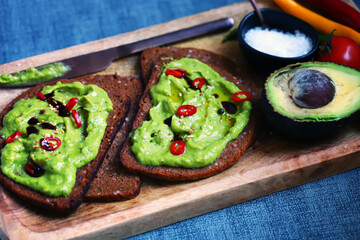 Guacamole toasted with hot peppers and olive oil. Healthy food. Keto diet.