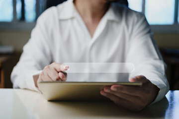 Searching information data on internet concept. Businessman using Tablet and touching virtual...