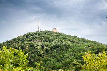 Fototapeta na wymiar Panorama of vrsacki breg, also called the mountain of vrsac, a major hill and massif of Banat province, in Vojvodina, serbia, with the vrsacki zamak castle and the vrsacka kula tower. ...