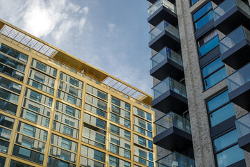 Fototapeta premium Exterior architectural detail modern facade of High-rise office buildings. Abstract Urban metropolis background.